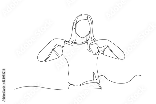 Single one line drawing confident girl pointing fingers down to show advertisement. Pointing concept. Continuous line draw design graphic vector illustration.