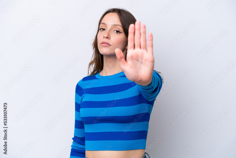 Young caucasian woman isolated on white background making stop gesture Young caucasian woman isolated on white background making stop gesture