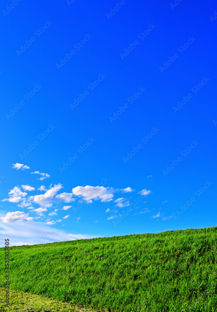 green field and blue sky green field and blue sky