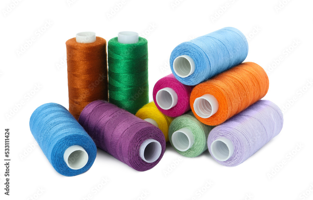 Set of different colorful sewing threads on white background Set of different colorful sewing threads on white background