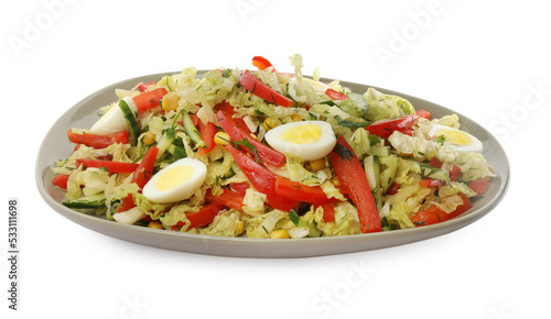 Plate of delicious salad with Chinese cabbage and quail eggs isolated on white