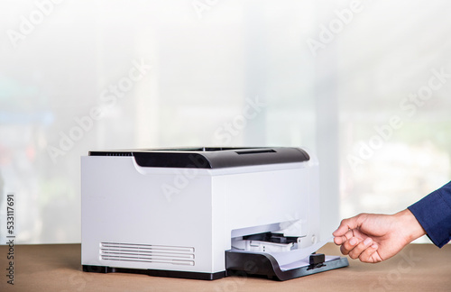 Printer, copier, scanner in office. Workplace ,photocopier machine for scanning document printing a sheet paper and xerox photocopy.