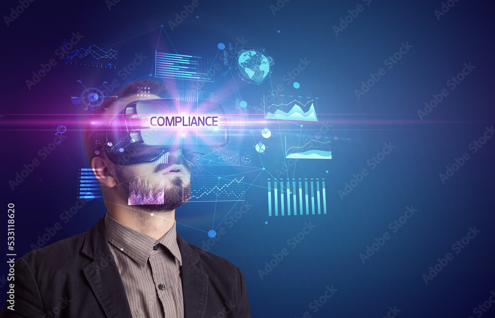 Businessman looking through Virtual Reality glasses Businessman looking through Virtual Reality glasses