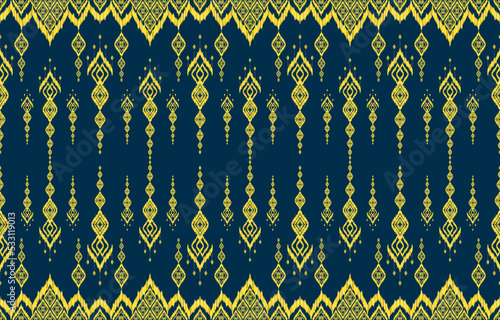 Royal elegant glow golden yellow color ikat seamless patterns on navy blue background. Geometric ornate luxurious line ethnic ikat fabric pattern. Asian folk print vector design vintage retro style.