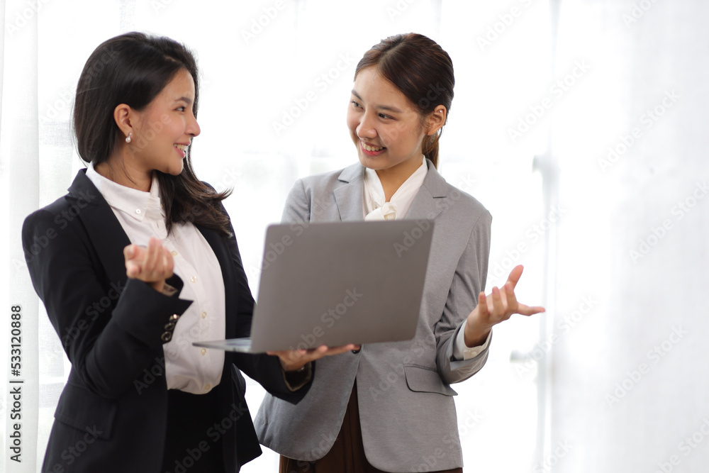 Colleagues, businesswomen or partners discussing, exchanging ideas, discussing successful business projects. Colleagues, businesswomen or partners discussing, exchanging ideas, discussing successful business projects.