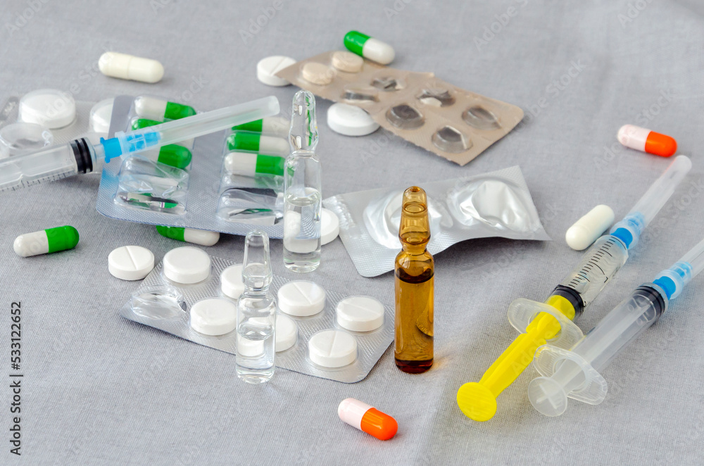 pills and syringe pills and syringe