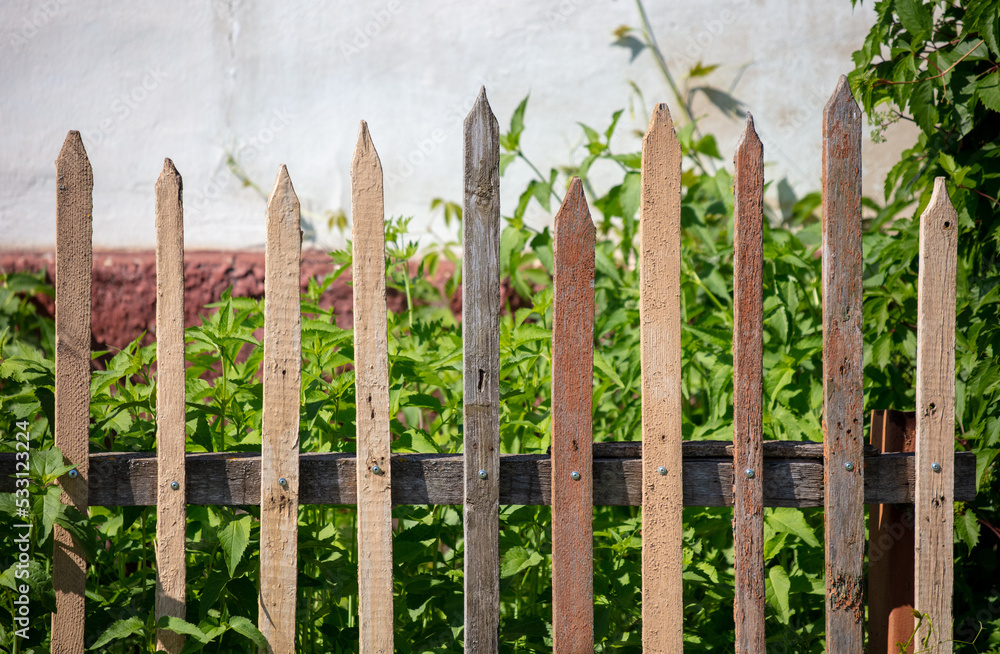 Old wooden boards on the fence as an abstract background. Old wooden boards on the fence as an abstract background.