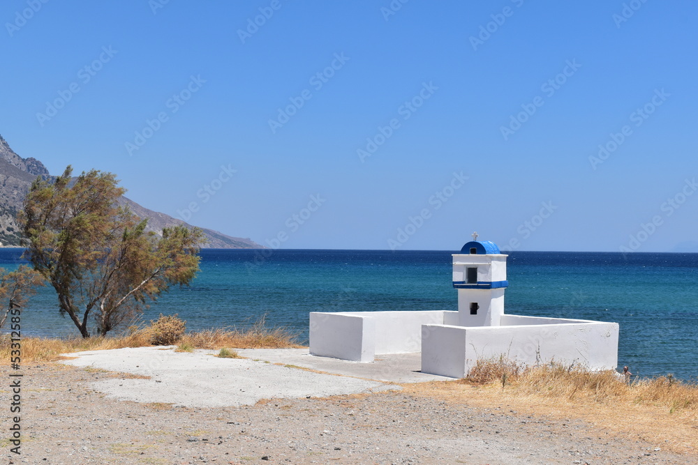 Obraz premium tiny greek lighthouse