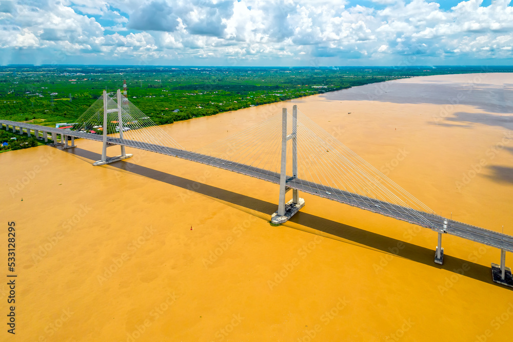 Fototapeta premium Cao Lanh bridge, Cao Lanh city, Vietnam, aerial view. Cao Lanh bridge is famous bridge in mekong delta, Vietnam.