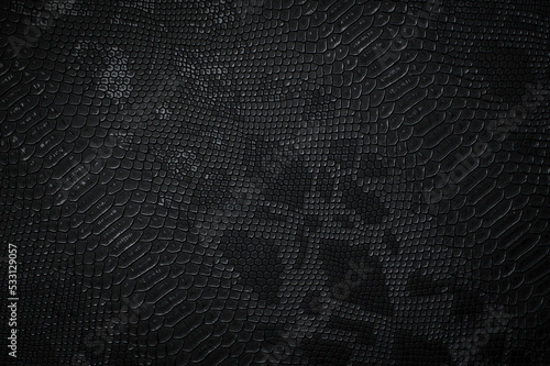 Vegan faux Snakeskin leather texture. minimalist and elegant textile. simple dark black backdrop