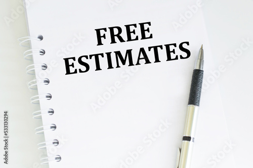 FREE ESTIMATES text on an open notepad on a bright table