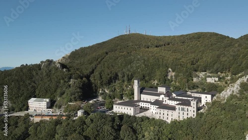 Aerial view of Montevergine monastery on mountain top during A Juta a Montevergine pilgrimage, Avellino, Italy. photo