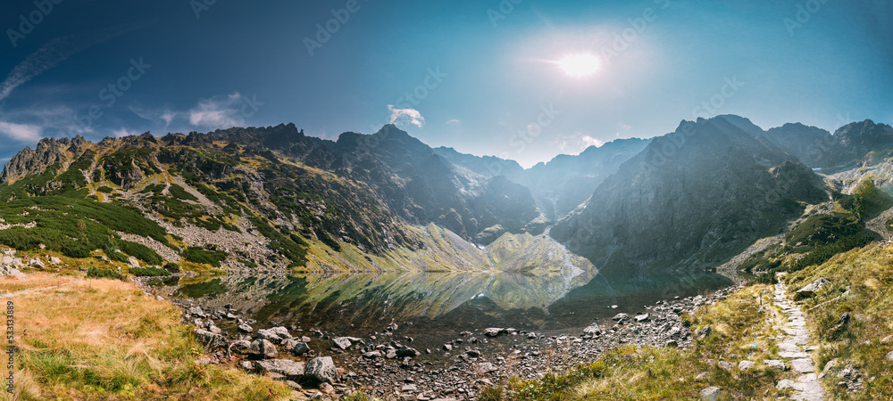 Tatra National Park, Poland. Calm Lake Czarny Staw Under Rysy And Summer Mountains Landscape. Beautiful Nature, Scenic Panoramic View Of Five Lakes Valley. UNESCO World Heritage Site. Panorama