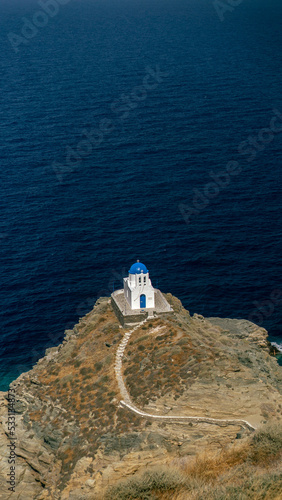 Church of the Seven Martyrs, a classic Greek church set high upon on the jagged cliff face of the Adriatic Sea