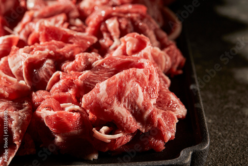 Thinly sliced raw meat, beef