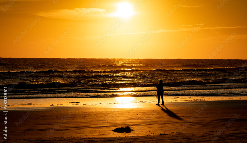 Person alone on beach