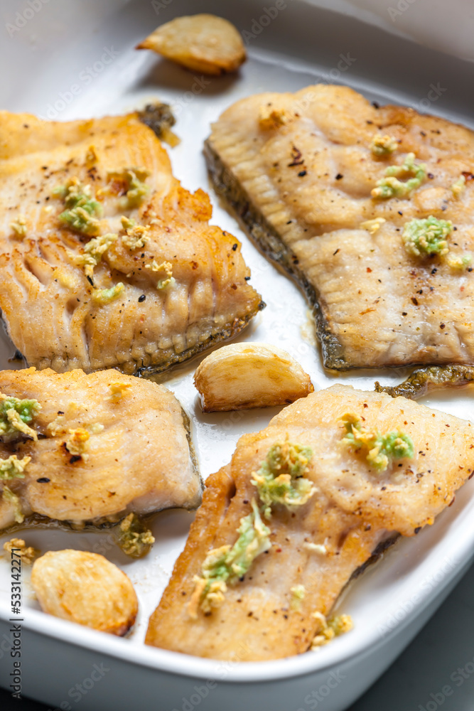 salmon trout baked with garlic