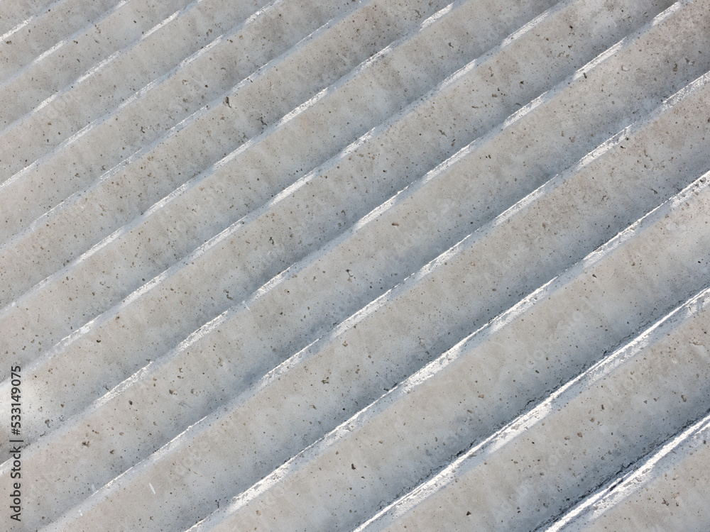 Shadows on gray concrete stairs on a sunny day Shadows on gray concrete stairs on a sunny day