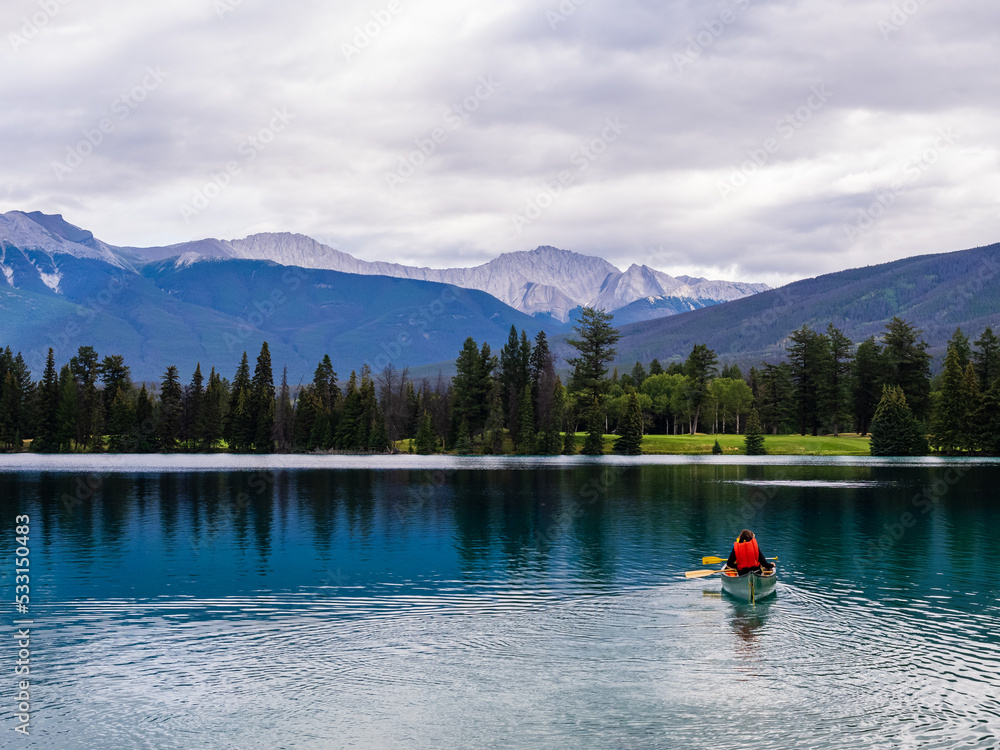 canoe on lake in jasper national park in canada canoe on lake in jasper national park in canada