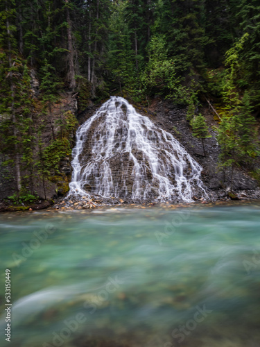 waterfall flowing into maligne canyon in jasper national park