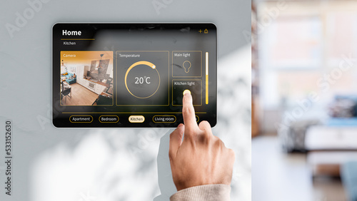 Canvastavla The man changes the settings on the tablet to control a smart home - an example