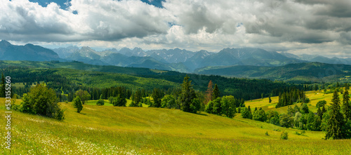 Fototapeta Naklejka Na Ścianę i Meble -  Mountains landscape with rolling hills, trees and meadows in tatras, Poland