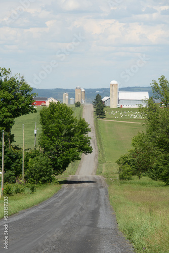 Small rural road in the Canadian countryside in the province of Quebec