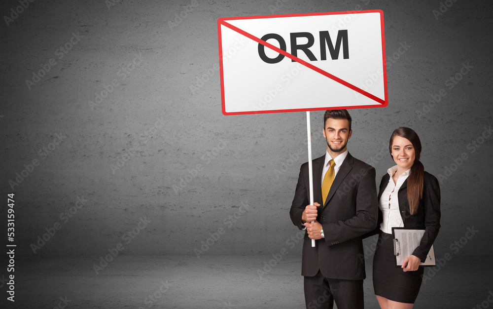 business person holding a traffic sign business person holding a traffic sign