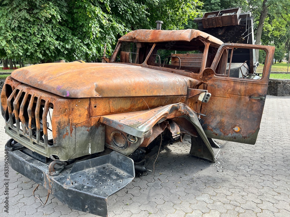 The Russian Ural truck that was carrying the artillery salvo fire system was neutralized. Russia's war in Ukraine. A torn military vehicle with cannons. Burned out metal of a car in the war. The Russian Ural truck that was carrying the artillery salvo fire system was neutralized. Russia's war in Ukraine. A torn military vehicle with cannons. Burned out metal of a car in the war.