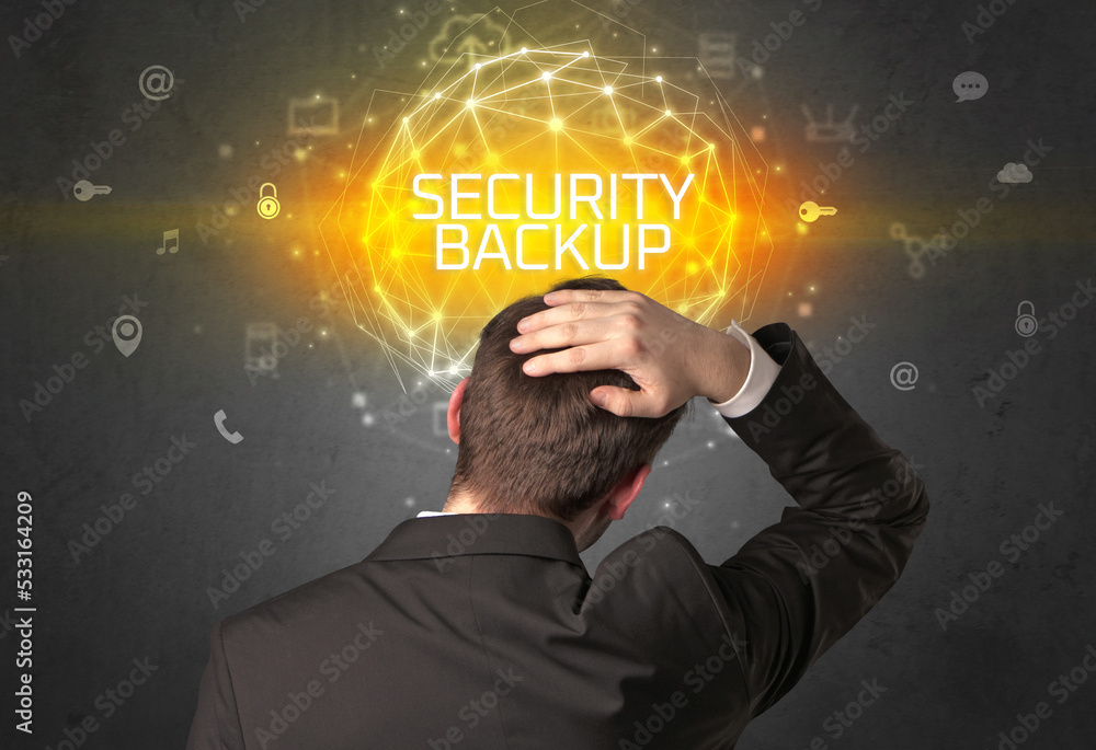 Rear view of a businessman, online security concept Rear view of a businessman, online security concept
