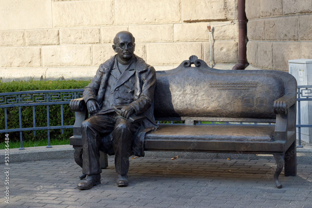 Naklejka premium Stanislaw Kozerowski's bench in Poznan is a monumental bench in memory of fr. prof. Stanislav Kozerovsky, one of the founders of Wszechnica Piastowska, the current Adam Mickiewicz University in Poznan