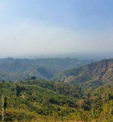 View of the hills of Bandarban, Bangladesh from top of a famous hill during the summer. Hills of bangladesh © Asif