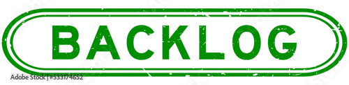 Grunge green backlog word rubber seal stamp on white background