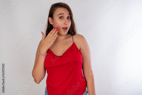Photography Woman posing on isolated white background, selective focus shot.