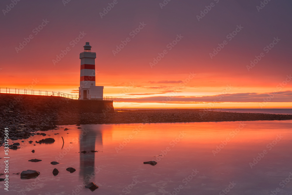 The Old Gardur Lighthouse is located in Iceland on the northern point of the Reykjanes Peninsula.