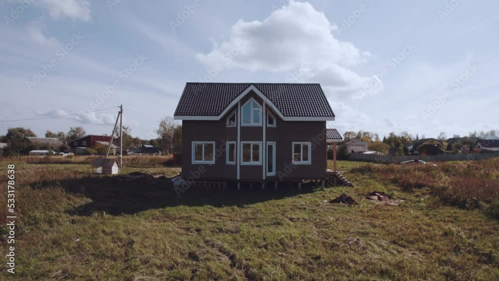 Aerial photography of a new house in a Russian village, newly built private house, construction of houses Aerial photography of a new house in a Russian village, newly built private house, construction of houses