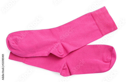 Pair of pink socks on white background, top view