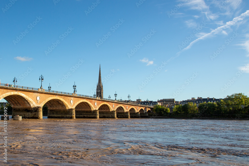 Pont de Pierre and church Saint Michel in Bordeaux town France