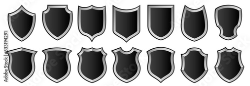 A set of vector badges and police stripes. Black insulated shields with a black and white gradient