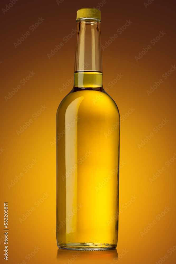 Bottle of whisky on amber shiny background. The object for mock-up making. Bottle of whisky on amber shiny background. The object for mock-up making.