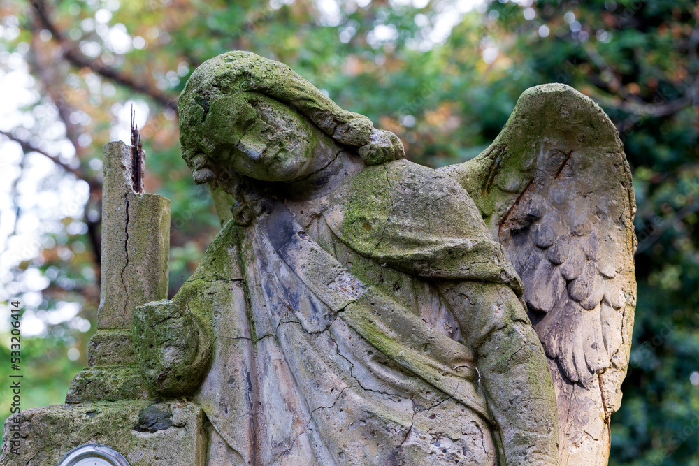 Historic Statue on the mystery old Prague Cemetery, Czech Republic