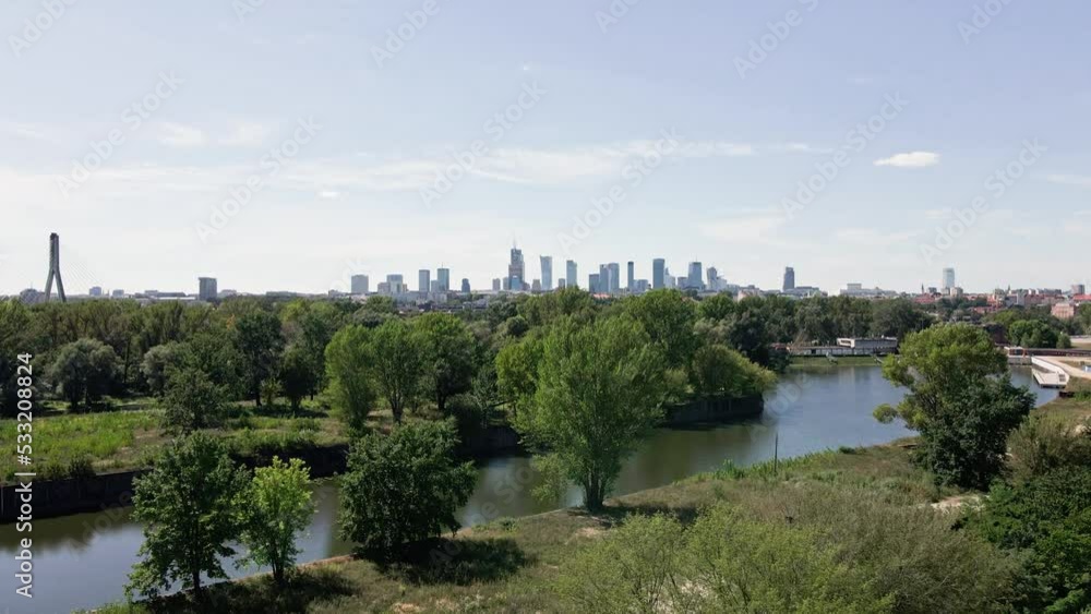 Warsaw aerial view over river and downtown skyline with skyscrapers, Panoramic cityscape of Warshawa city at summer day Warsaw aerial view over river and downtown skyline with skyscrapers, Panoramic cityscape of Warshawa city at summer day