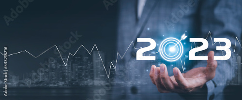 Business touch target and number new year2023, innovative idea of ​​inspiration from online technology, Changes in new planning, Business growth, ideas and perspectives. photo