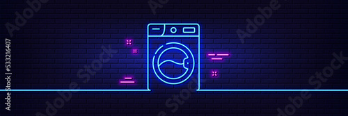 Neon light glow effect. Washing machine line icon. Laundry service sign. Clothing cleaner symbol. 3d line neon glow icon. Brick wall banner. Washing machine outline. Vector
