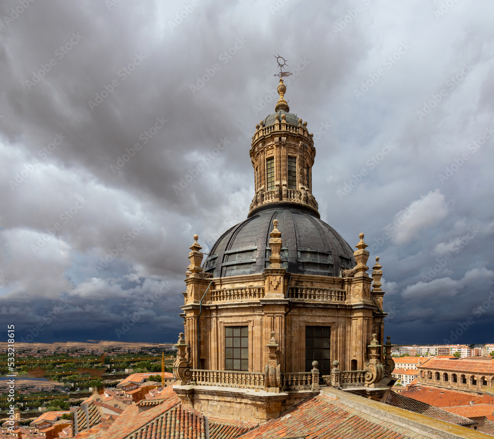 Dome of the church of La Clerecía in Salamanca from the top of one of its towers. Spectacular sky.