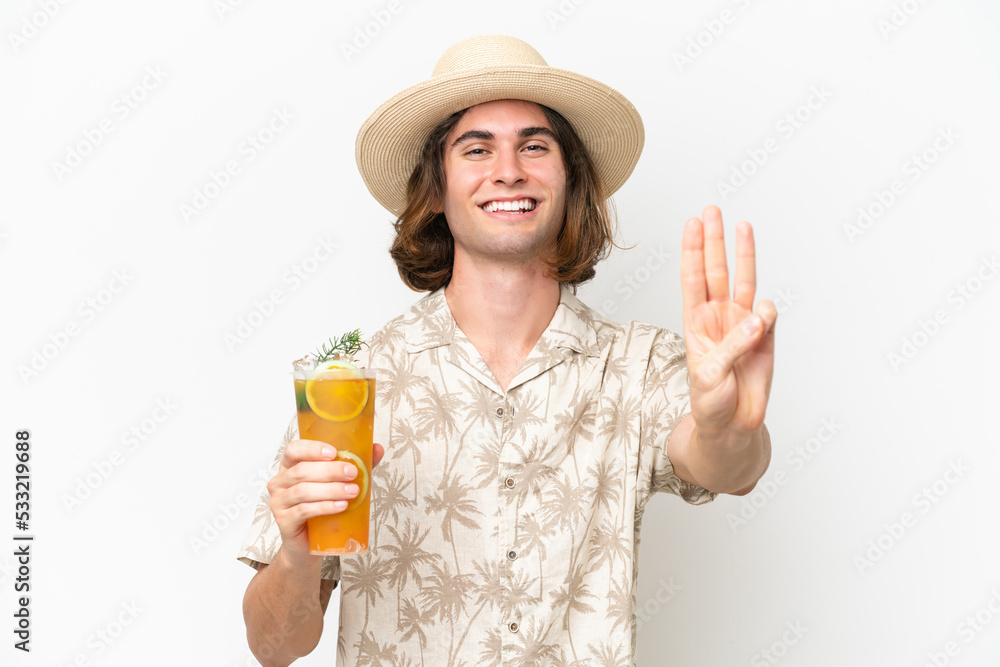 Young handsome man holding a cocktail isolated on white background happy and counting three with fingers Young handsome man holding a cocktail isolated on white background happy and counting three with fingers