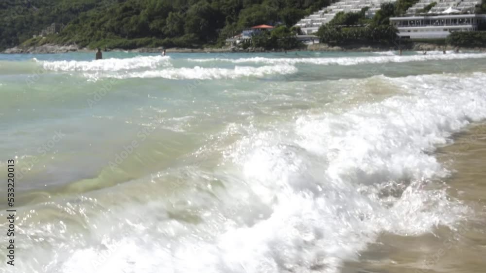 Sea waves roll on the coast. Sea view hotel in Phuket. Tourism and travel concept Sea waves roll on the coast. Sea view hotel in Phuket. Tourism and travel concept