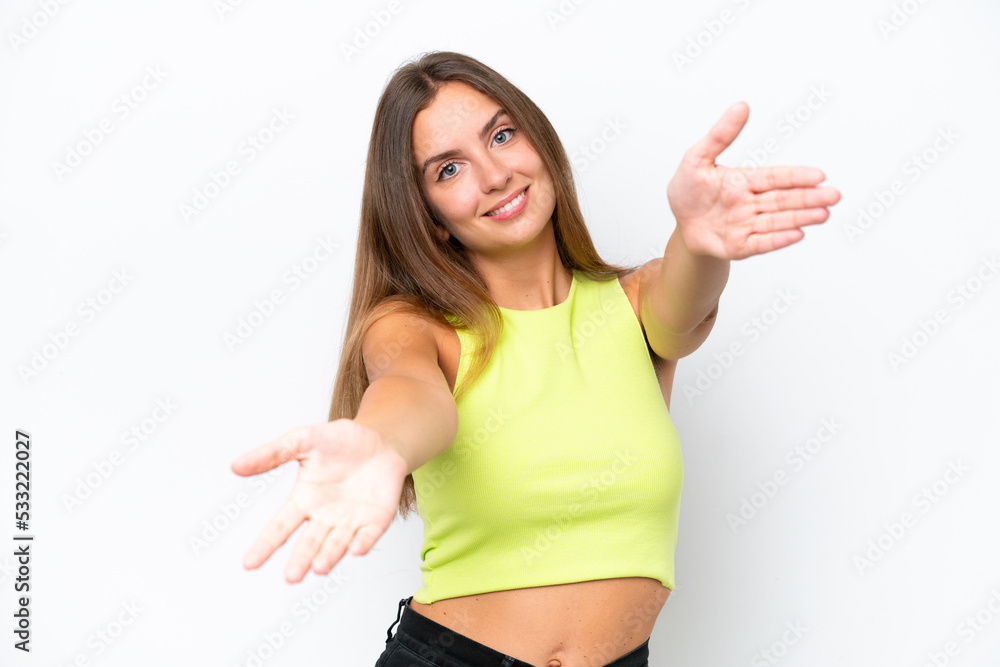 Young caucasian woman isolated on white background presenting and inviting to come with hand Young caucasian woman isolated on white background presenting and inviting to come with hand