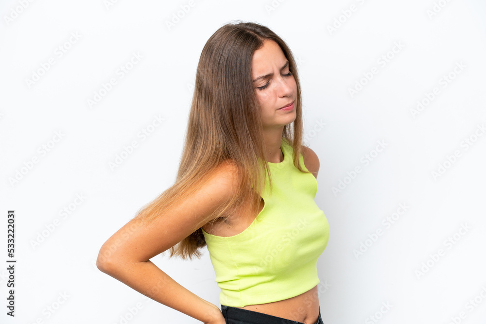 Young caucasian woman isolated on white background suffering from backache for having made an effort Young caucasian woman isolated on white background suffering from backache for having made an effort