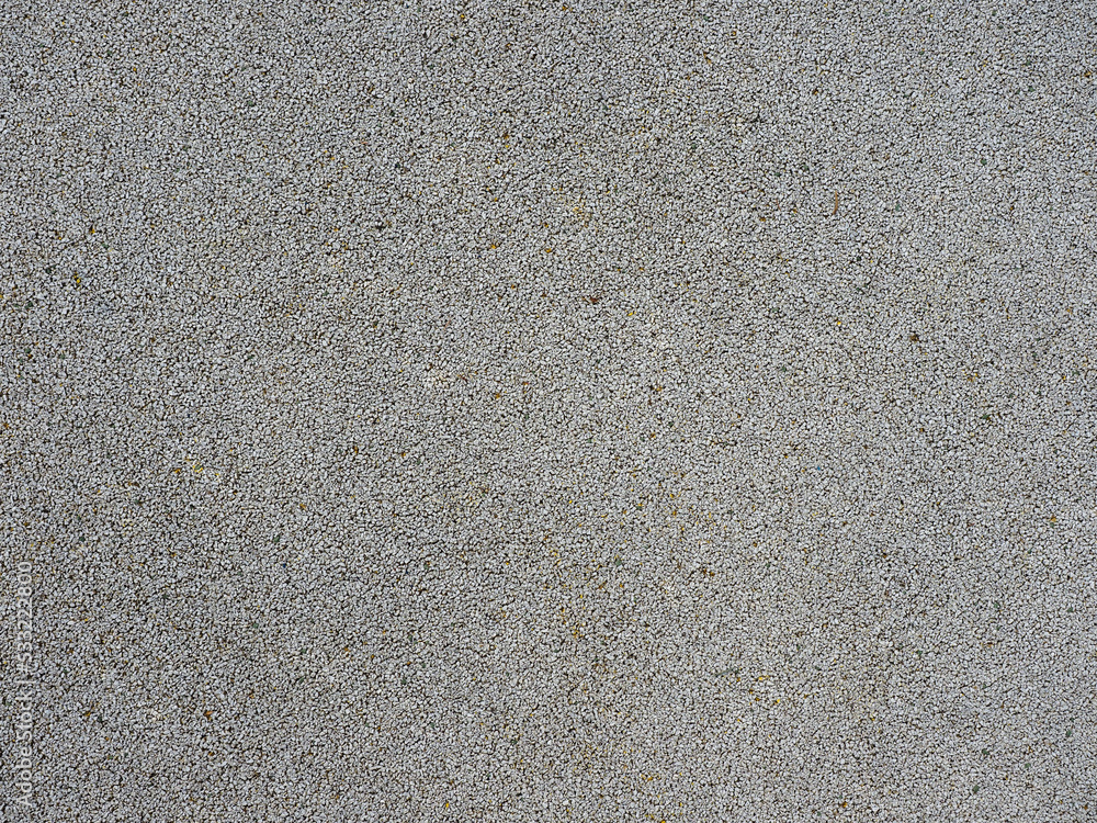 grey pebbles texture background. park or playground flooring material grey pebbles texture background. park or playground flooring material